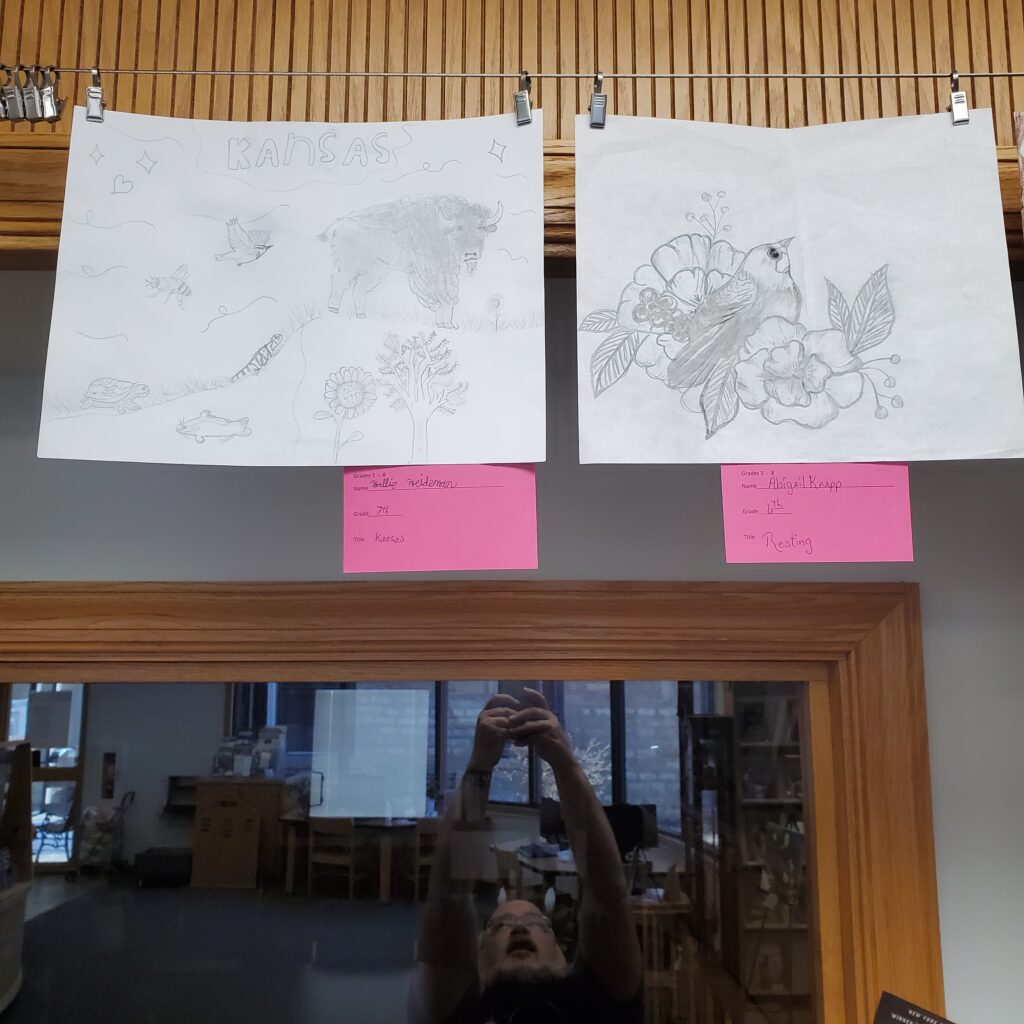 Two pencil sketches.