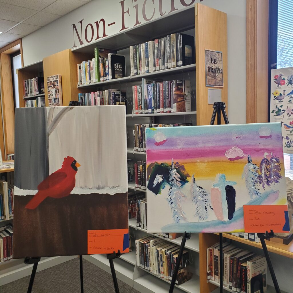 Left a painting of a Cardinal on a fence. Right a heavily textured abstract painting of a cross on a winter hillside.