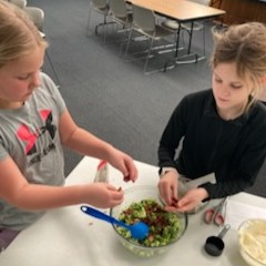 Participants mix ingredients.