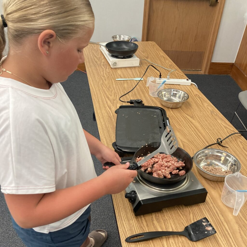Frying the meats.