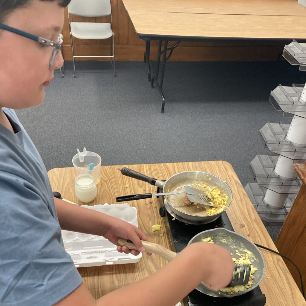 Scrambling the eggs.