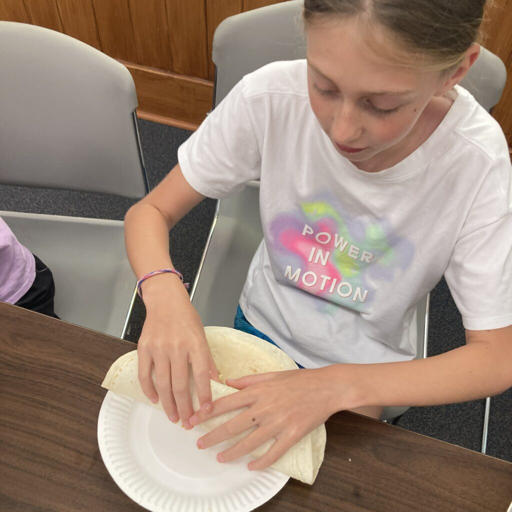 Rolling a burrito.