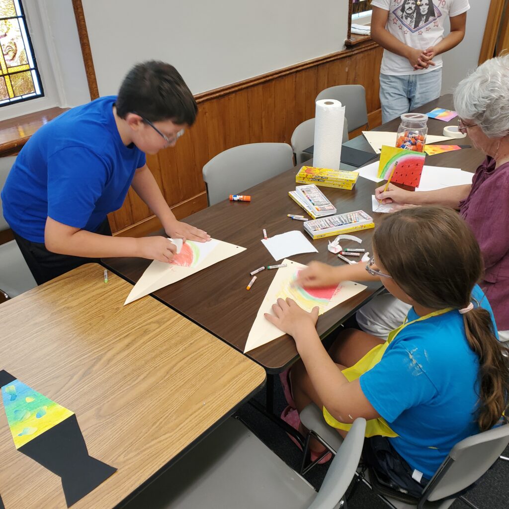 Designs in oil pastels.