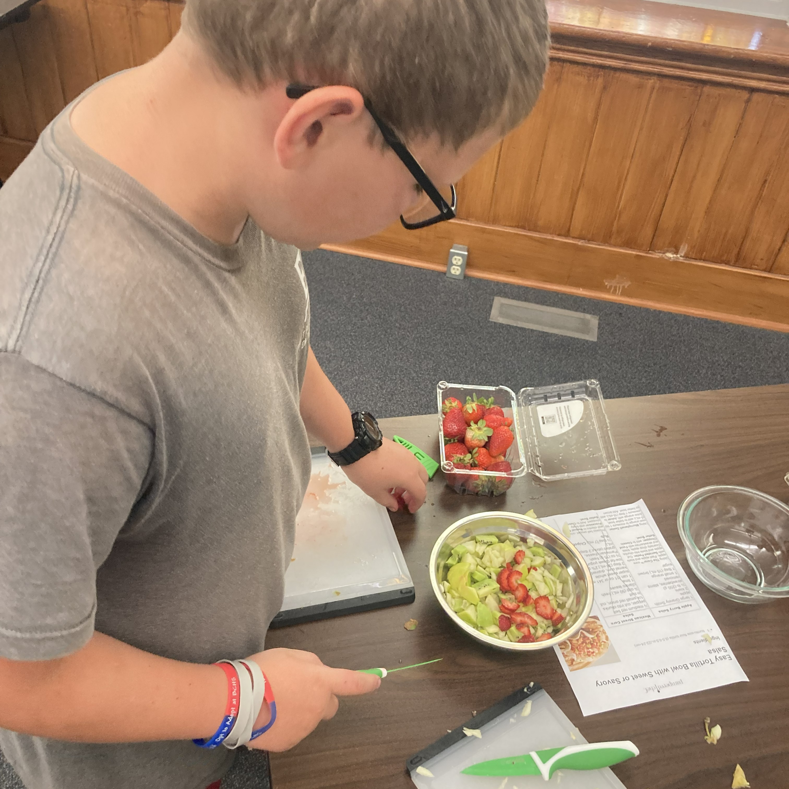 Dicing fruit for salsa.