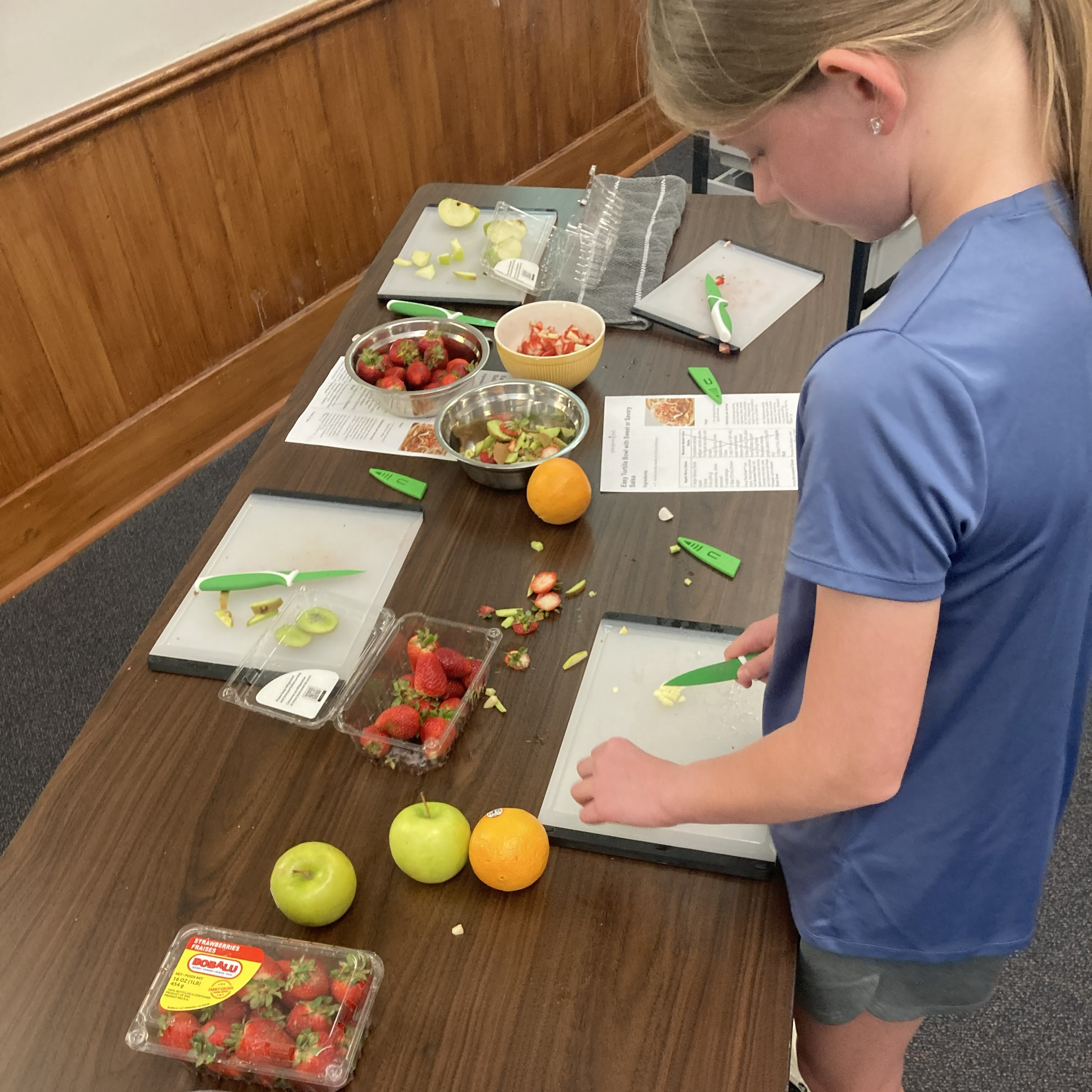 Dicing fruit for salsa.