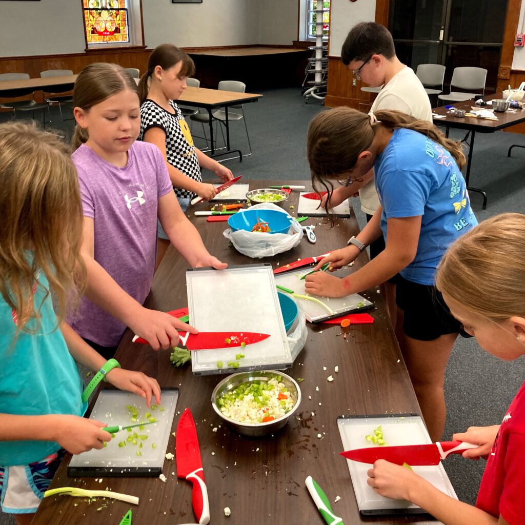 Chopping veggies.
