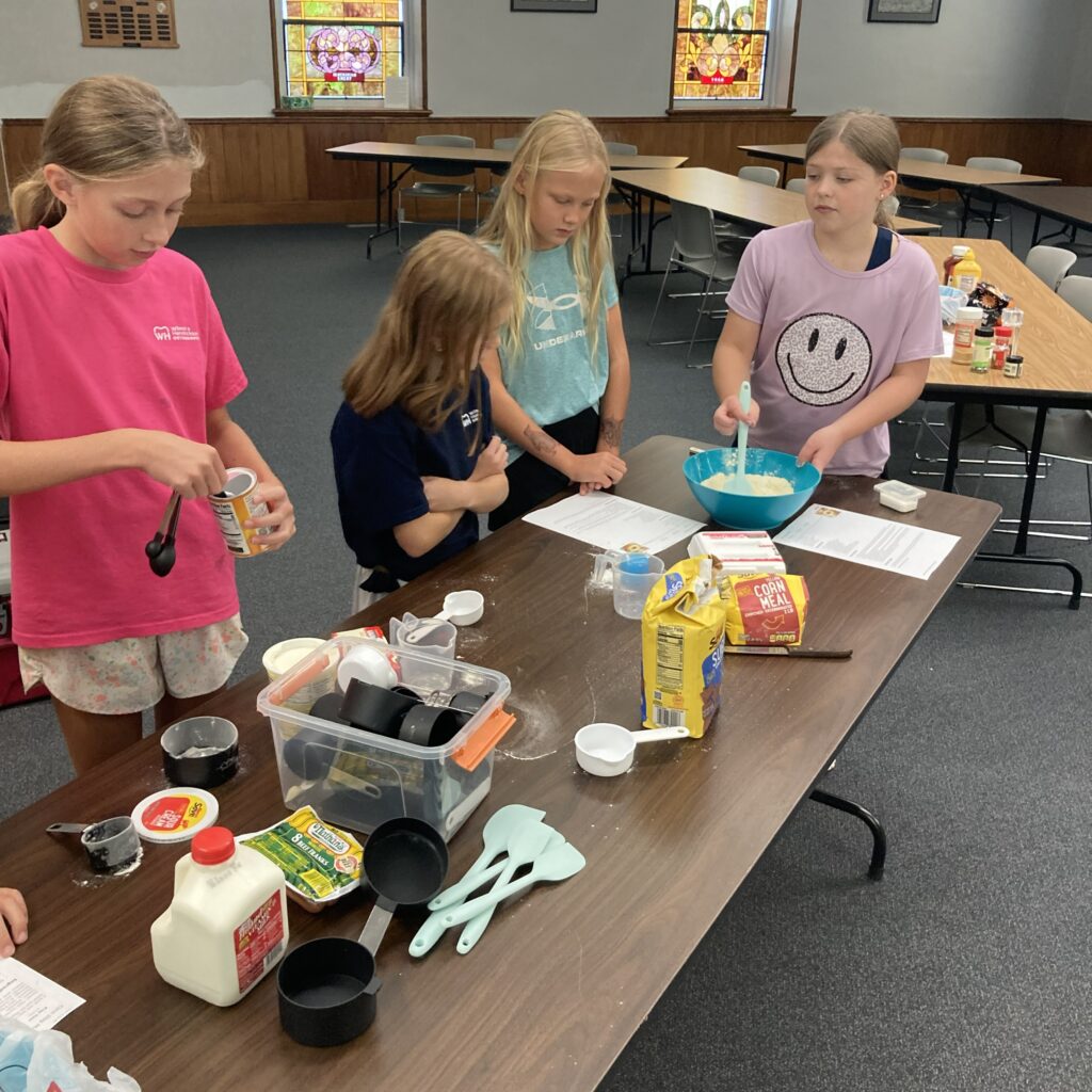 Measuring and stirring.